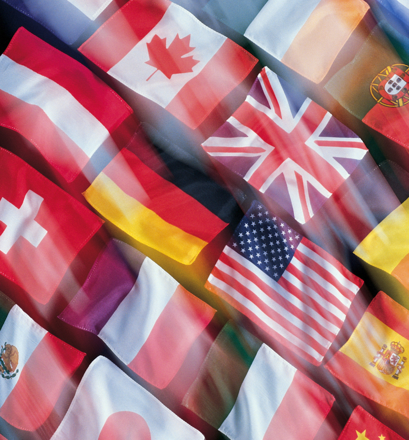 International flags of Canada, the UK, Germany, America, Spain, Italy, France, and Japan, representing the most active countries for Forex Trading.